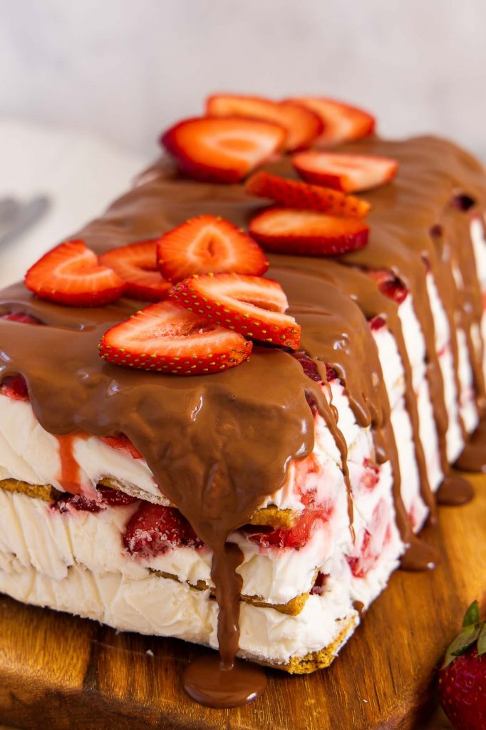 Strawberry Icebox Cake on a cutting board.