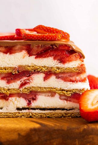 Strawberry Icebox cake on a cutting board.