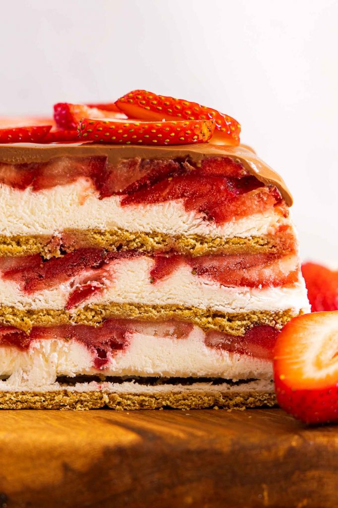 Strawberry Icebox cake on a cutting board.