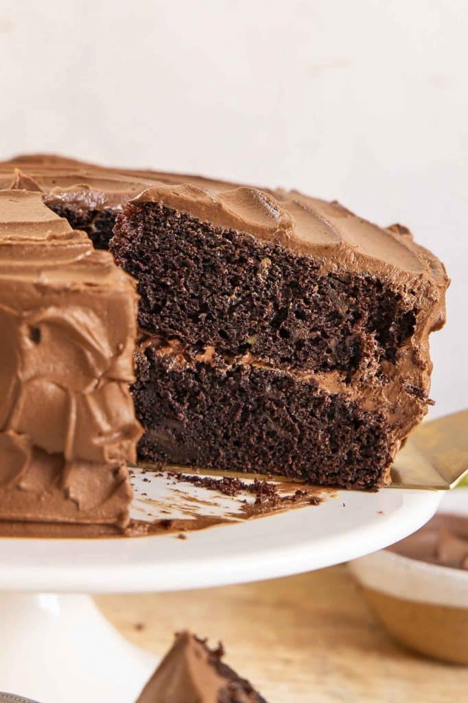 Chocolate zucchini cake with slice taken out.