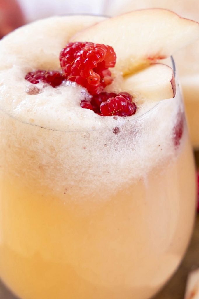 Peach Bellini in a glass.