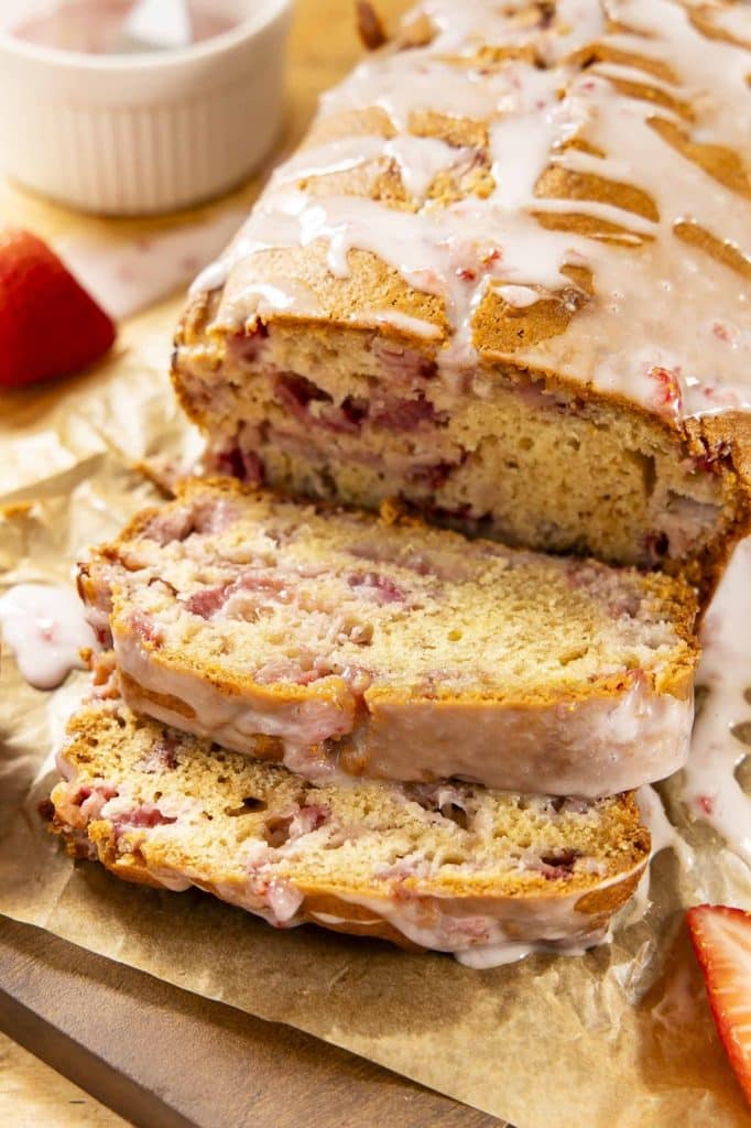 Strawberry bread on a cutting board.