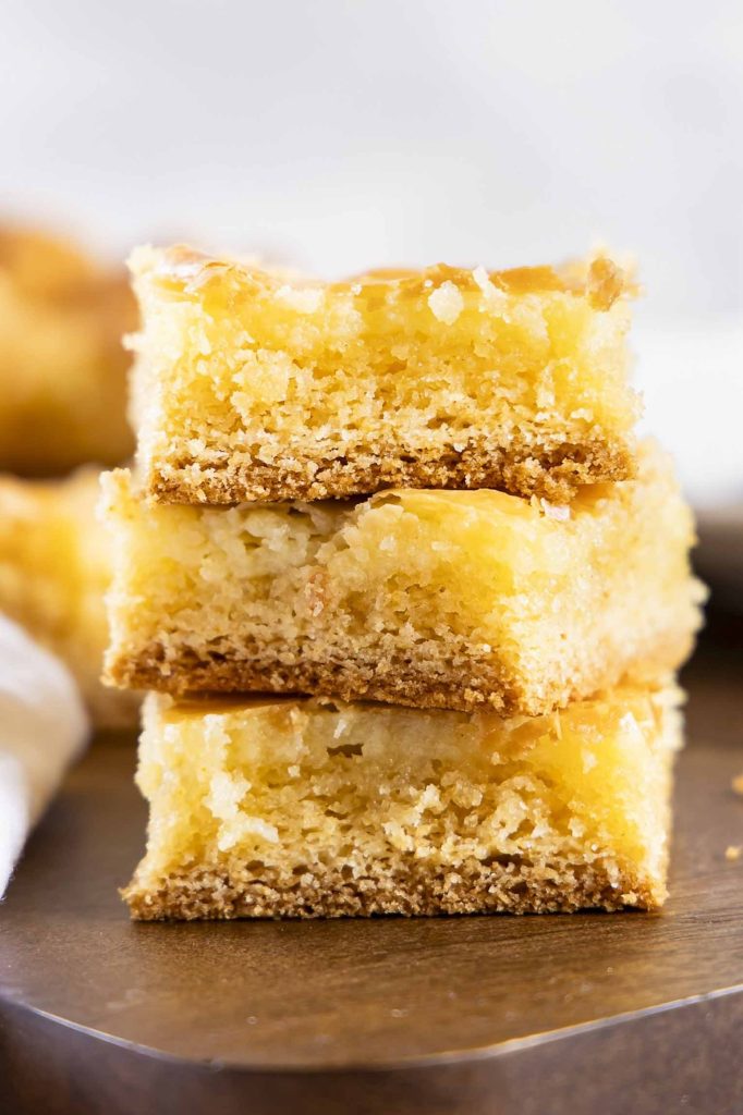 A stack of three gooey butter cake squares.